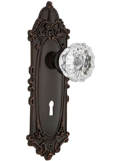 Largo Door Set with Fluted-Crystal Glass Knobs and Keyhole in Timeless Bronze.